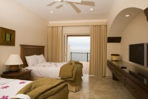 queen bed room Pueblo Bonito Montecristo Estates offers spectacular ocean views of the pacific ocean in cabo san lucas, overlooking quivira golf club