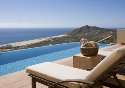 Infinity pool at Pueblo Bonito Montecristo Estates offers spectacular ocean views of the pacific ocean in cabo san lucas, overlooking quivira golf club